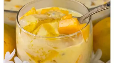 Glass bowl filled with mango sago 